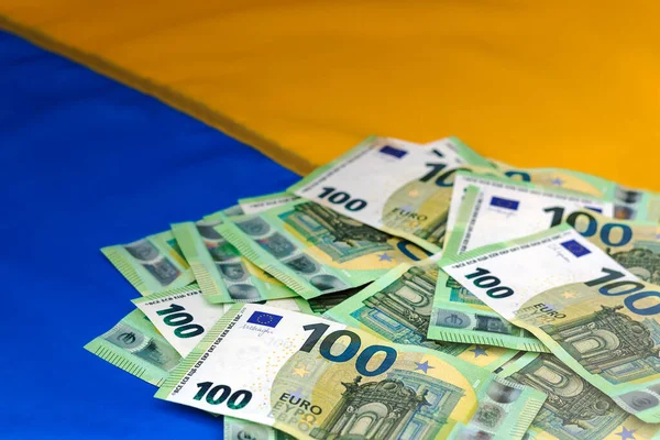 depositphotos_614975994-stock-photo-euro-money-help-ukraine-donate