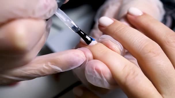 depositphotos_552946080-stock-video-manicure-pedicure-master-applies-decor