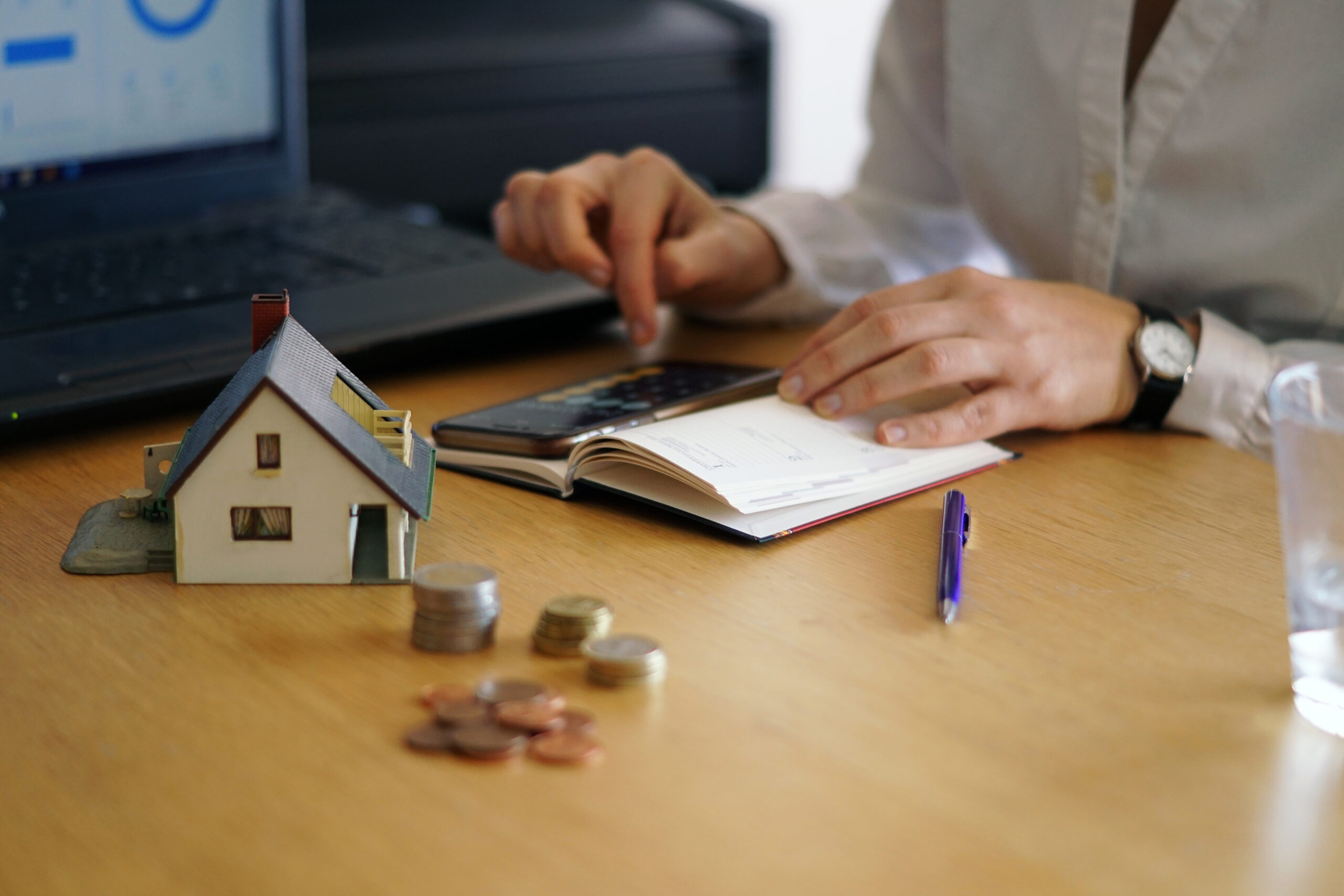 closeup-shot-person-thinking-buying-selling-house-1-scaled